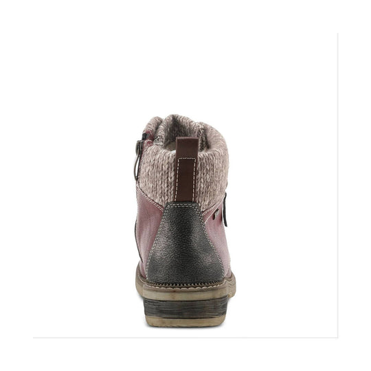 Rear view of a mid-calf knit and faux leather boot with a pull tab and stacked sole