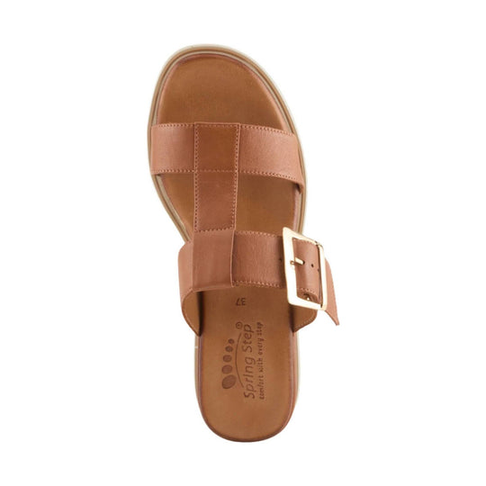 Tan leather sandal with wide straps, gold buckle, and visible insole branding