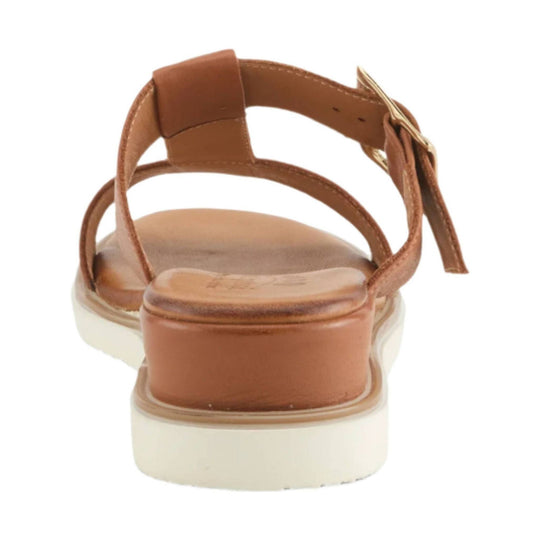 Brown strappy sandal with an ankle buckle and white platform sole, rear view