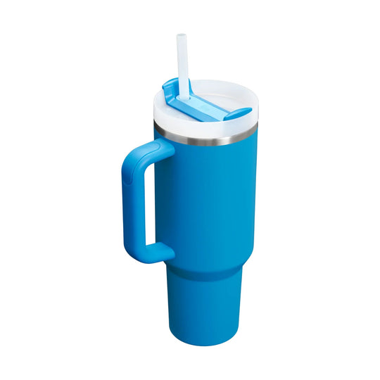 Blue handled tumbler with clear lid and straw