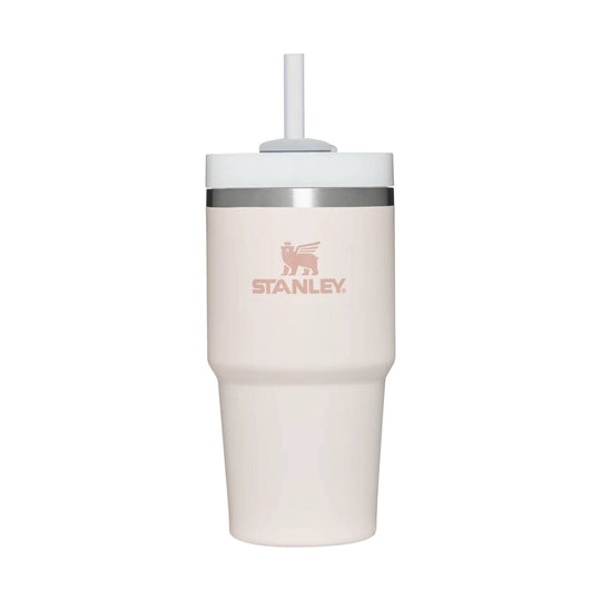 Light pink insulated tumbler with a clear straw lid and STANLEY logo