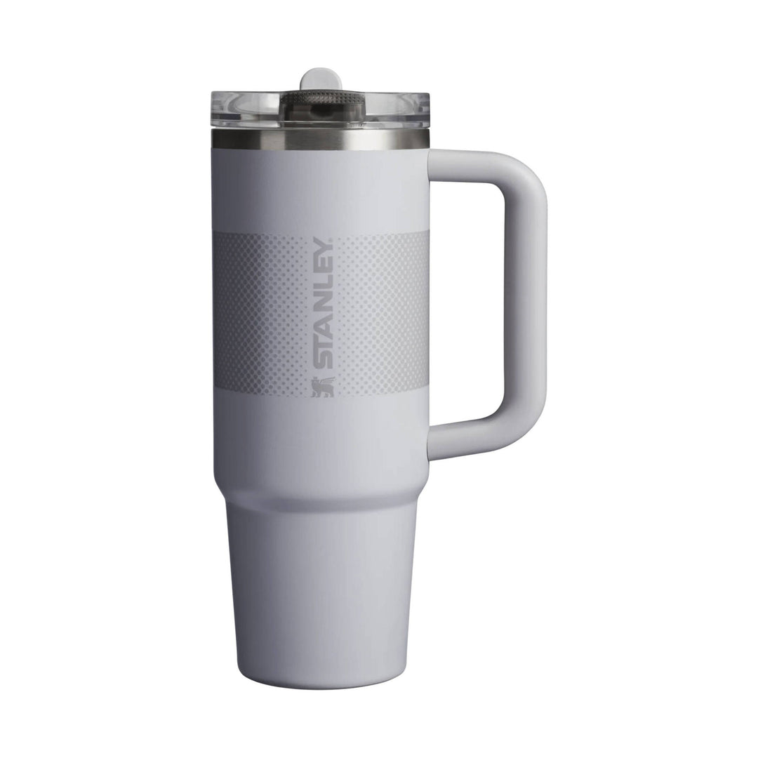 Gray handled tumbler with clear flip-straw lid and vertical Stanley logo