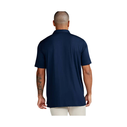Navy short-sleeve polo shirt shown from the back