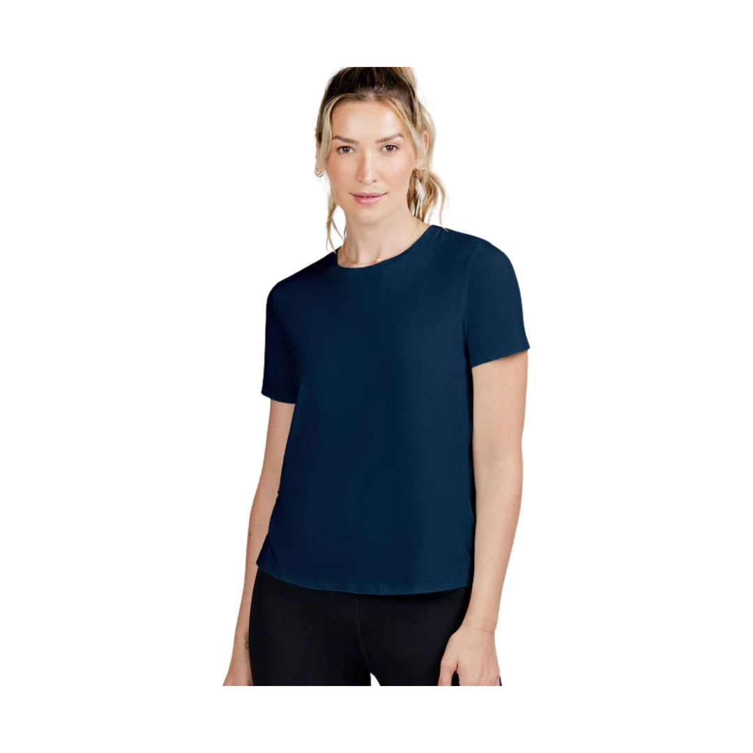 Dark navy short-sleeve crewneck tee on a model against a white background