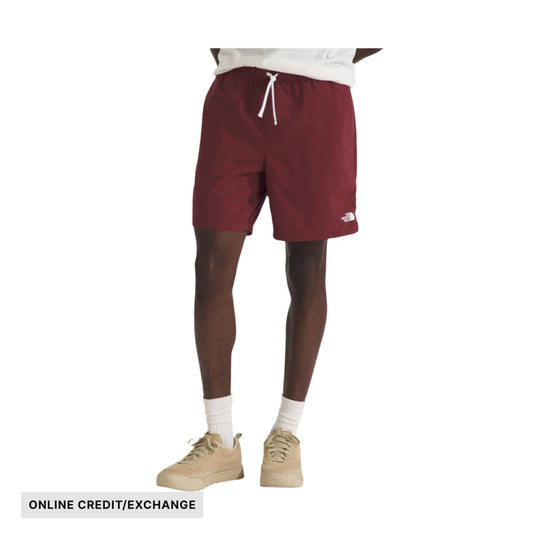 Maroon athletic shorts with a white drawstring on a model