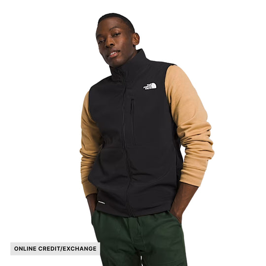 Black zip-up vest with tan long sleeves and chest logo, with "ONLINE CREDIT/EXCHANGE" text