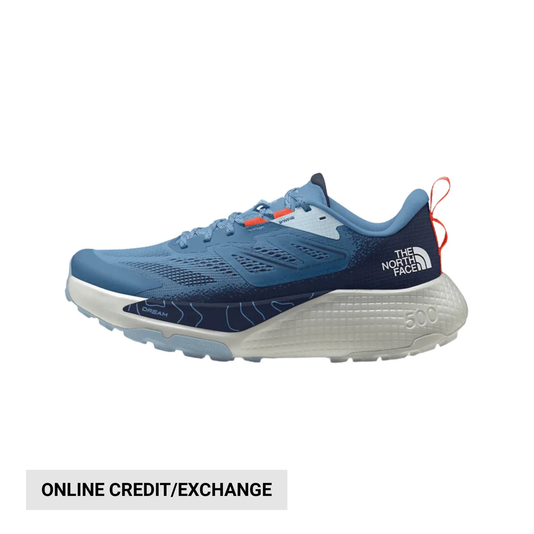 Blue trail running shoe with white midsole, side logo, and orange heel pull loop