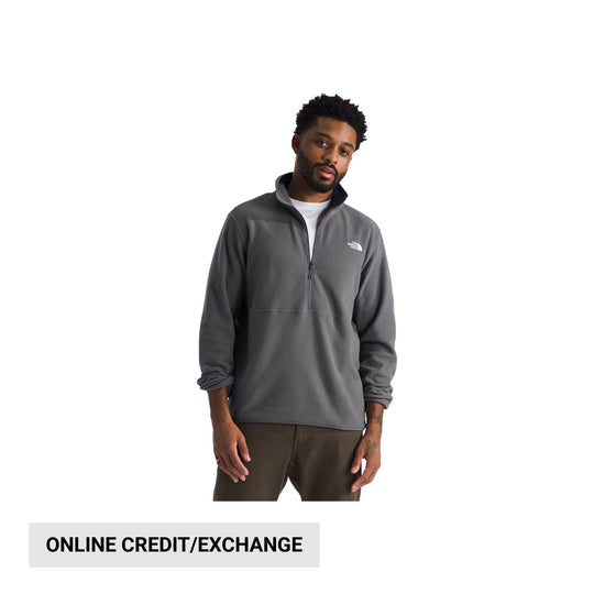 Gray half-zip fleece pullover with a small chest logo, shown on a model