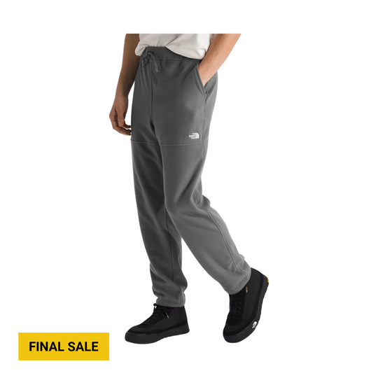 Gray fleece jogger pants with drawstring waist and side pockets, shown on a model.