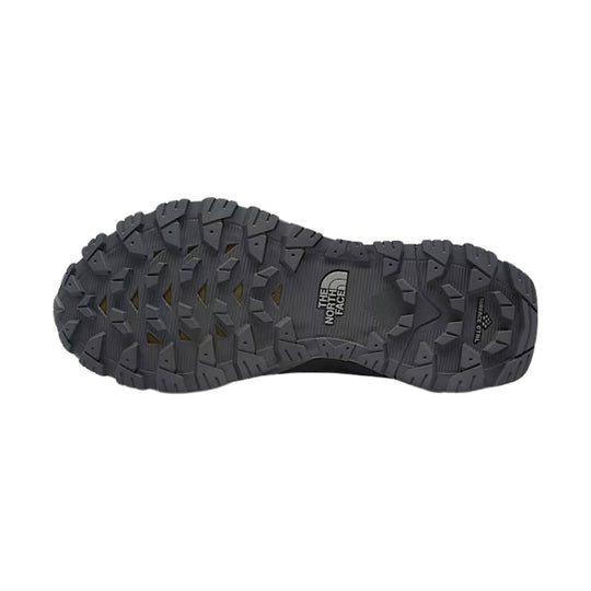 Dark gray hiking boot outsole with aggressive tread and The North Face logo