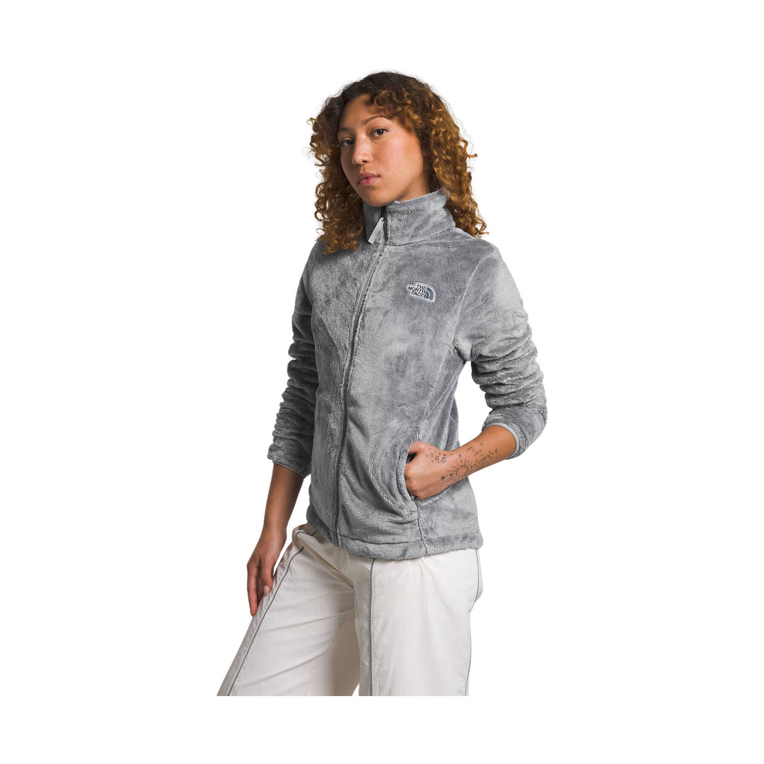 Gray fleece zip-up jacket with stand collar, chest logo, and hand pockets