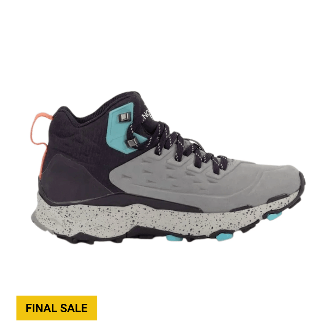 Mid-top hiking boot with gray upper, black collar, teal ankle panel, speckled white midsole, and black laces