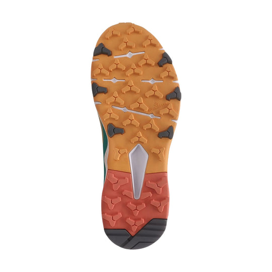 Trail shoe outsole with orange and coral rubber tread, black traction lugs, and a gray midfoot shank.