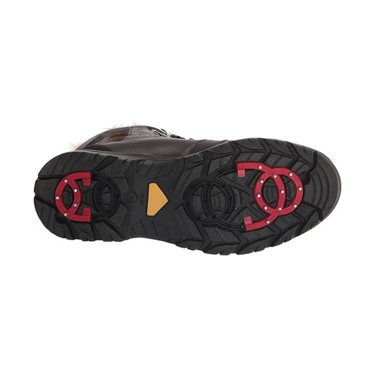 Black winter boot outsole with red metal cleats