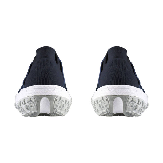 Pair of navy knit slip-on sneakers with white soles, shown from the back
