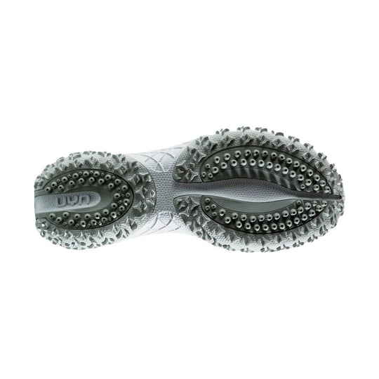 Gray trail shoe outsole with lugged tread and circular traction pods