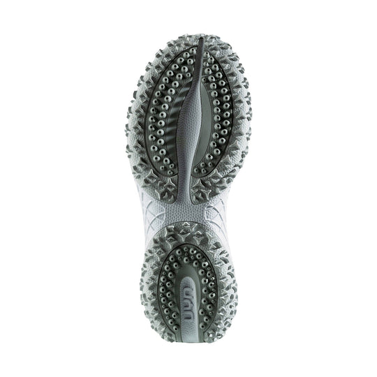 Gray and white athletic shoe outsole with deep tread and circular traction pods