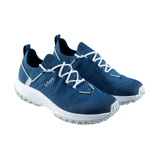 Blue knit running shoes with white laces and thick white soles