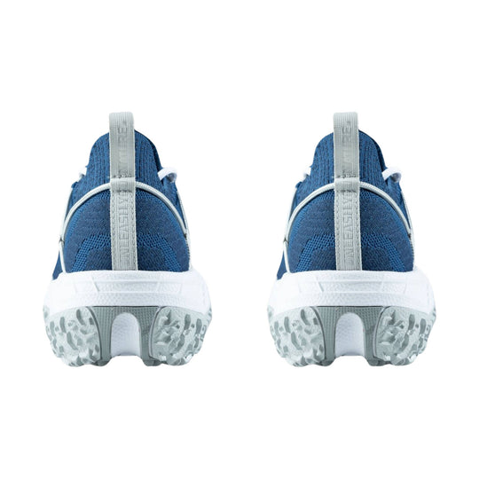 Blue knit trail shoe seen from the back with a white sole and gray pull tab