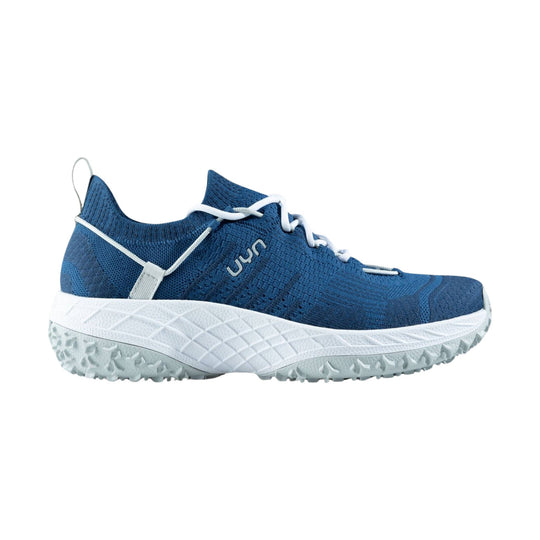 Blue knit trail running shoe with white laces, thick white midsole, lugged outsole, and side logo