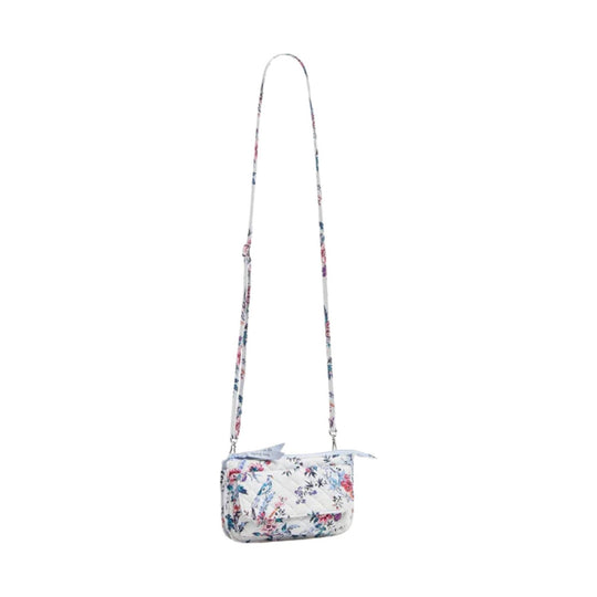 Quilted floral crossbody wallet with a long adjustable strap and front flap pocket