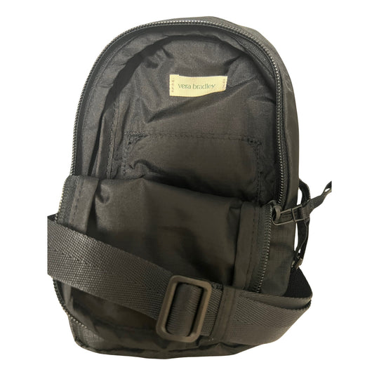 Black sling backpack with front zip pocket, adjustable strap, and visible Vera Bradley label