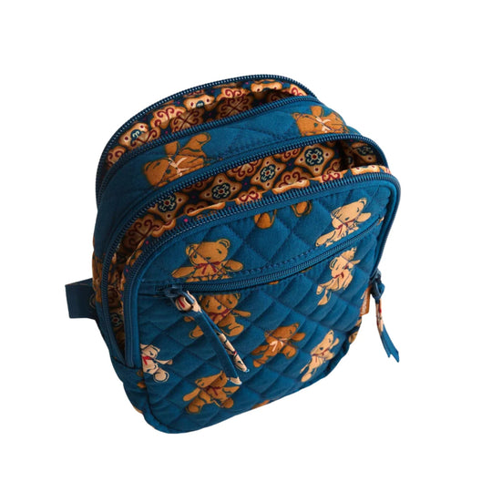 Blue quilted crossbody bag with teddy bear print and front zip pocket