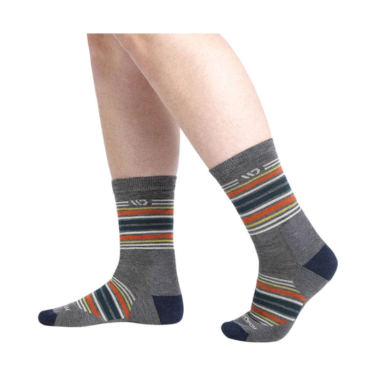 Gray micro crew socks with multicolor horizontal stripes, navy toe and heel, shown on lower legs.
