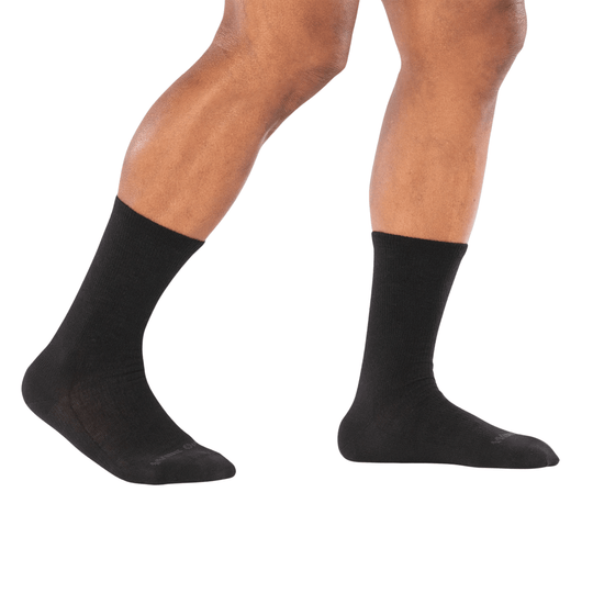 Black crew socks worn on a model's lower legs