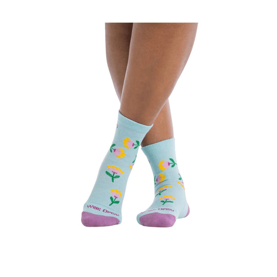 Light blue crew socks with colorful floral pattern and lavender toes and heels