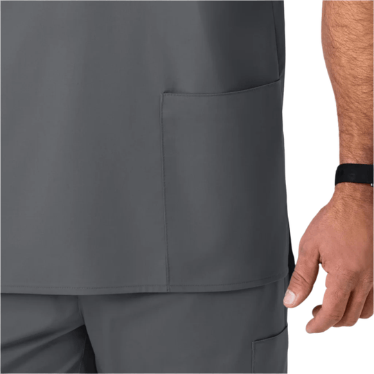 Gray scrub top with a chest pocket and matching pants, shown on a model from the waist down