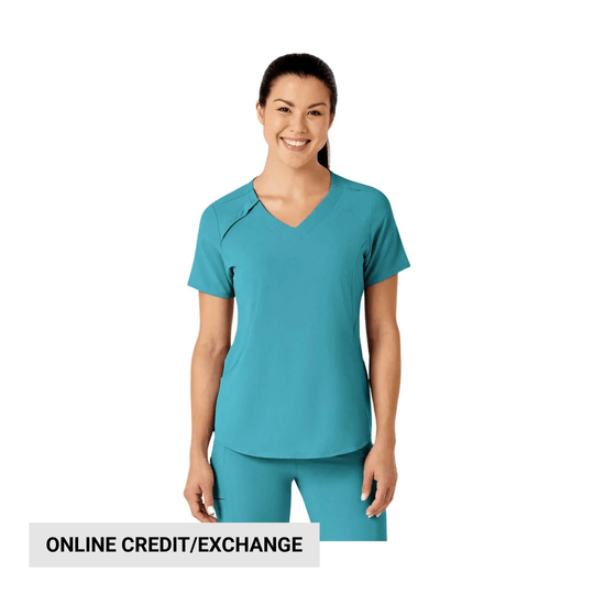 Woman wearing teal V-neck scrub top and matching pants