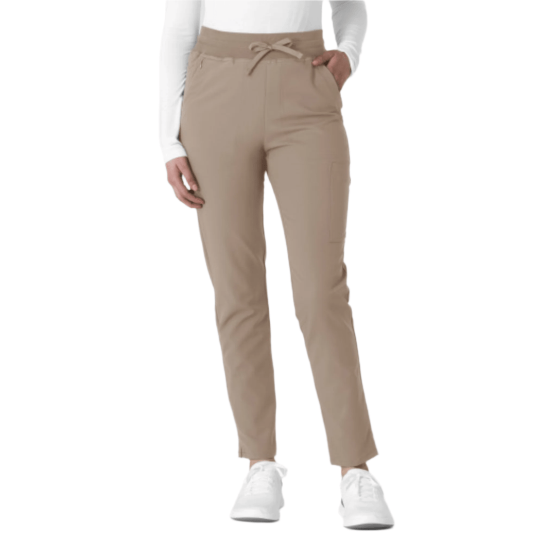 Beige straight-leg cargo scrub pants with drawstring waist and side pocket, shown on a model