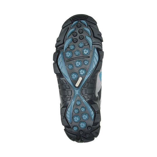 Boot sole with black tread, blue traction inserts, and deep lug pattern