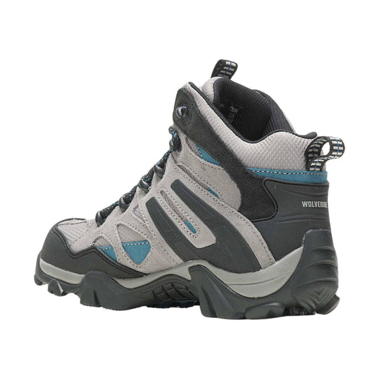 Grey mid-cut hiking boot with black sole, blue accents, and pull tabs
