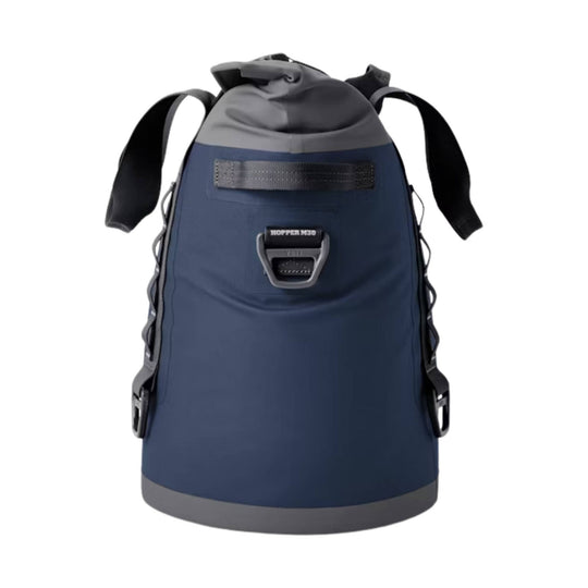 Navy backpack-style soft cooler with roll-top opening, shoulder straps, and front buckle latch