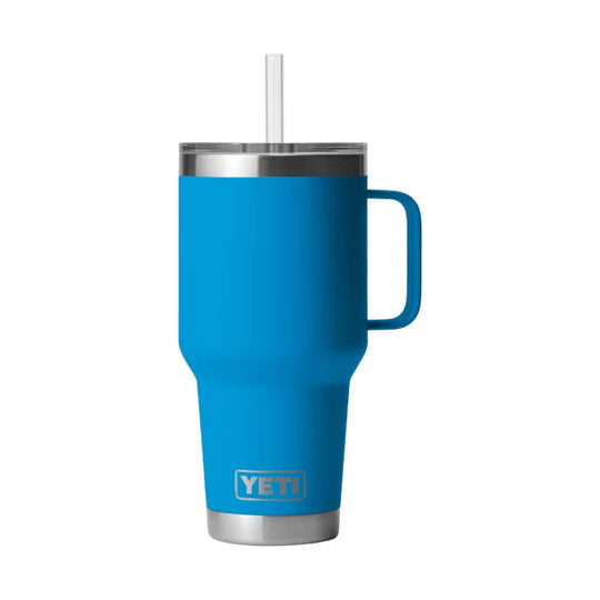 Blue handled tumbler with stainless steel lid, clear straw, and YETI logo