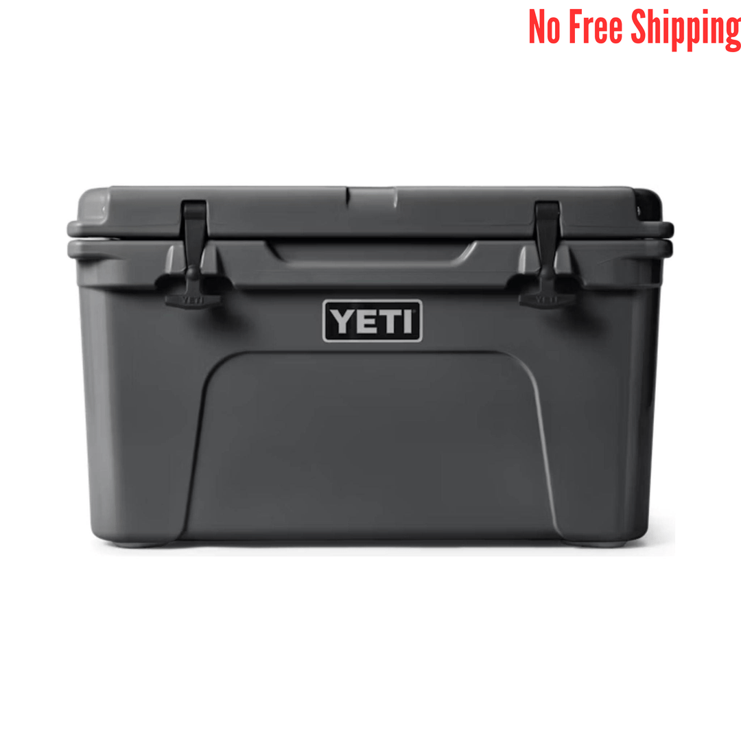 Dark gray hard cooler with latches and a front logo badge