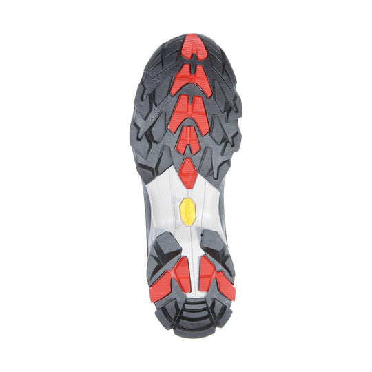 Black hiking boot outsole with red tread lugs and a Vibram logo