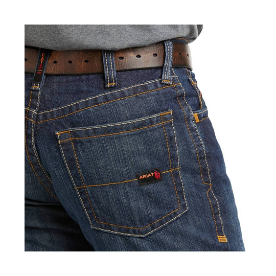 Dark wash jeans with orange contrast stitching, back pocket, and brown leather belt at the waist