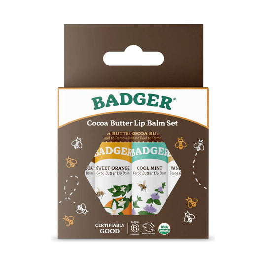 Brown boxed lip balm set with a window showing four tubes