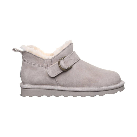 Gray suede ankle boot with shearling lining, strap buckle, and lug sole