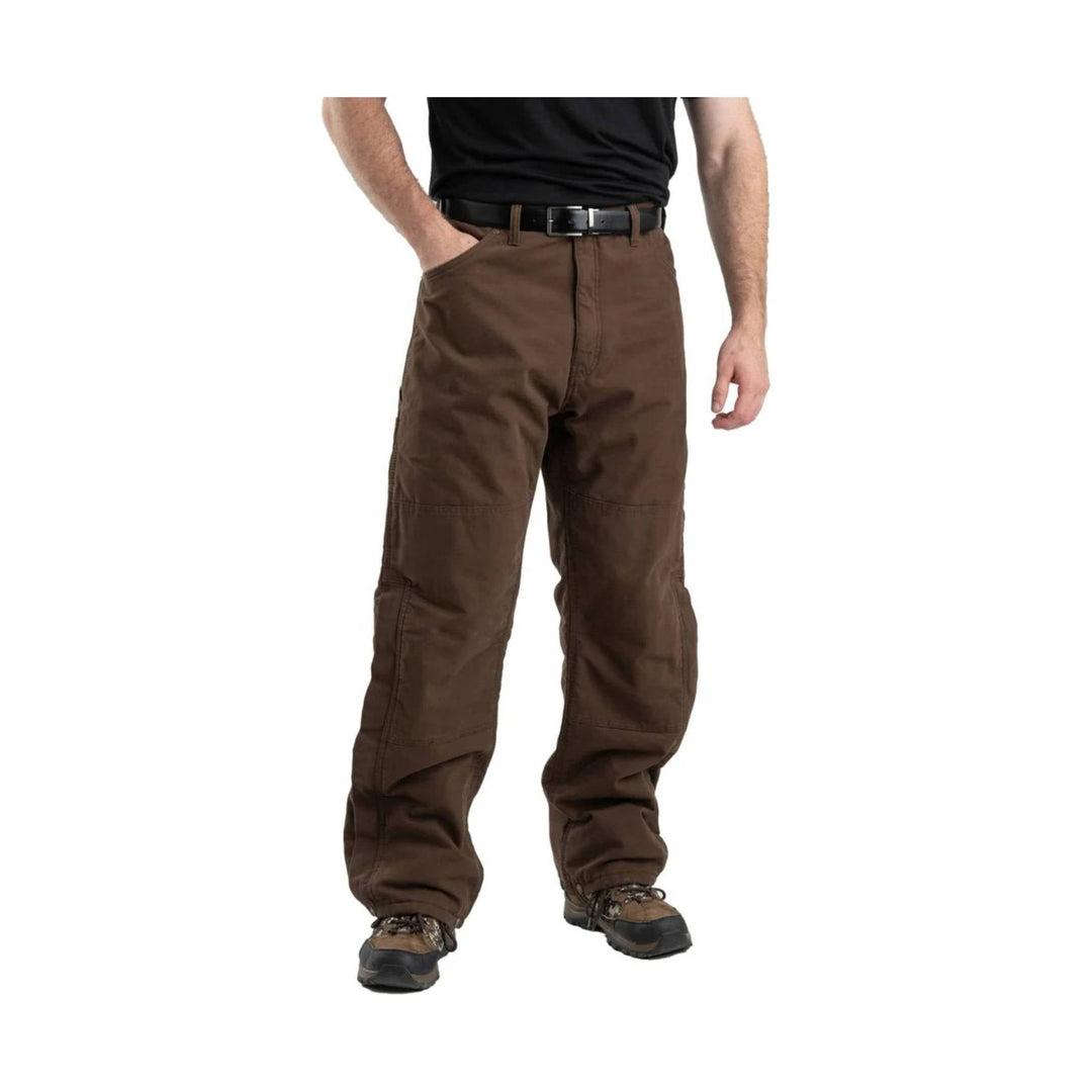 Brown insulated work pants with reinforced knees and a straight leg, shown with a black belt and hiking boots.