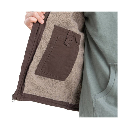 Brown sherpa-lined vest shown open with a front patch pocket and zipper hem