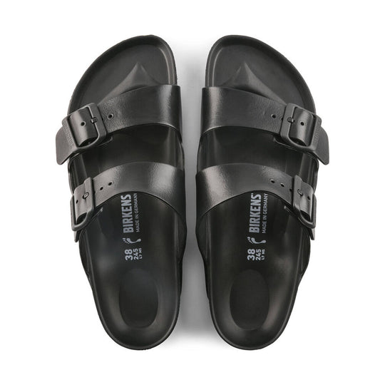 Black two-strap slide sandals with buckles, viewed from above