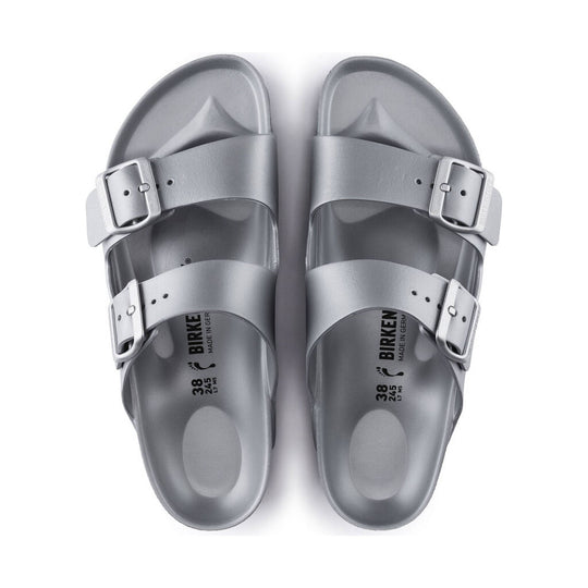 Metallic silver two-strap slide sandals with double buckles, shown from above
