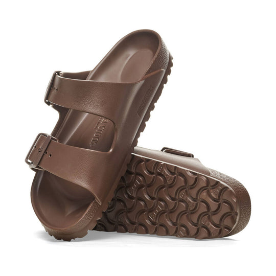 Brown two-strap slide sandal with contoured footbed and textured sole