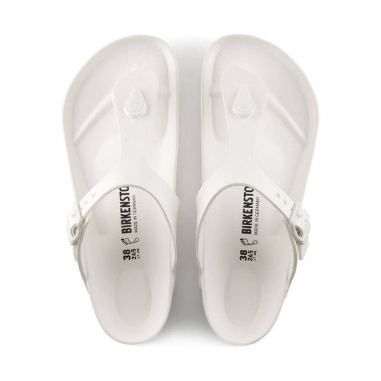 White EVA thong sandals shown from above with molded footbeds and adjustable side straps