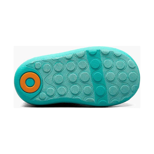Turquoise rubber boot sole with circular traction dots and an orange circular heel accent