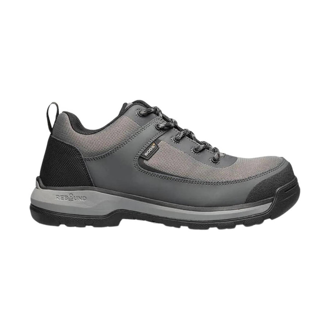 Gray and black low-top work shoe with mesh panels, laces, and a rugged rubber sole